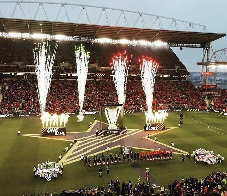 Fireworks bursting above a stadium during the MLS Cup